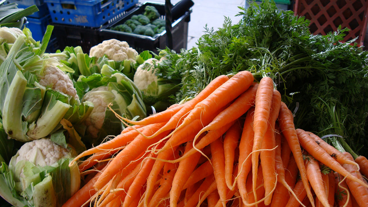 Fresh seasonal vegetables including carrots and cauliflower